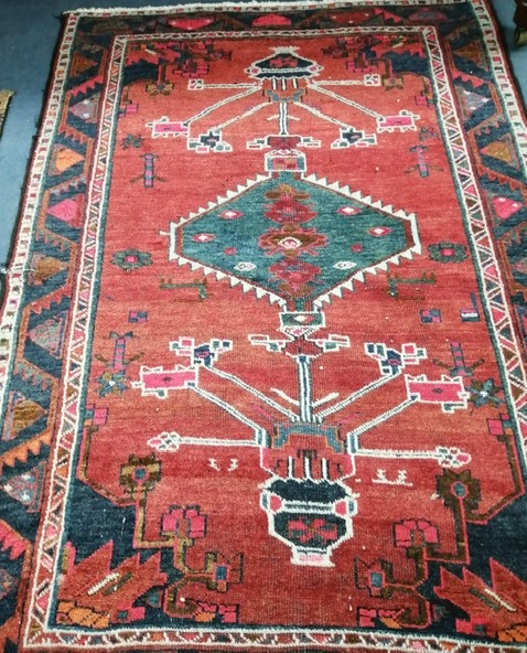 A Turkish red rug 140 x 200cm